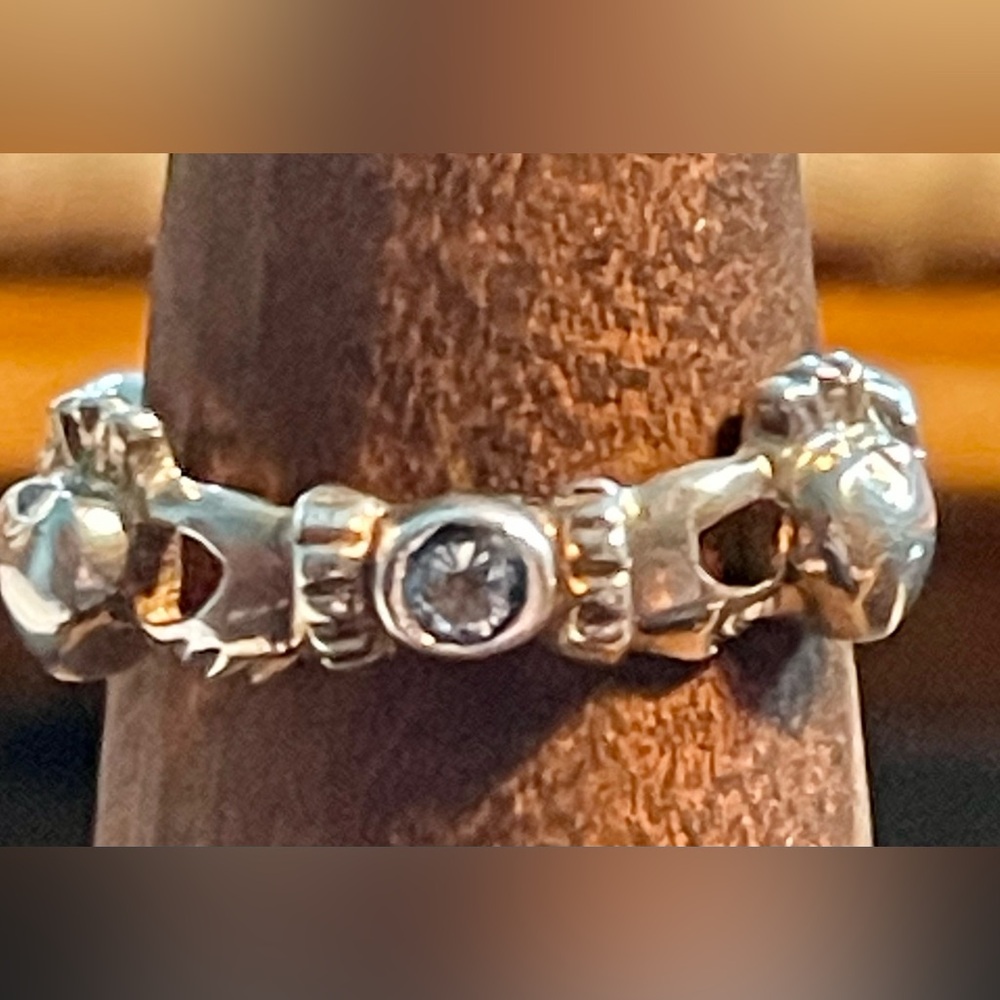 Claddaugh Celtic stamped 925 ring  size 5  3 Stones blue topaz  weighs  2.6 gms